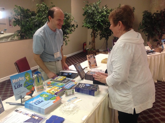 Writer's Workshop Joe at Book Table